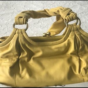 Authentic pale yellow COACH purse
